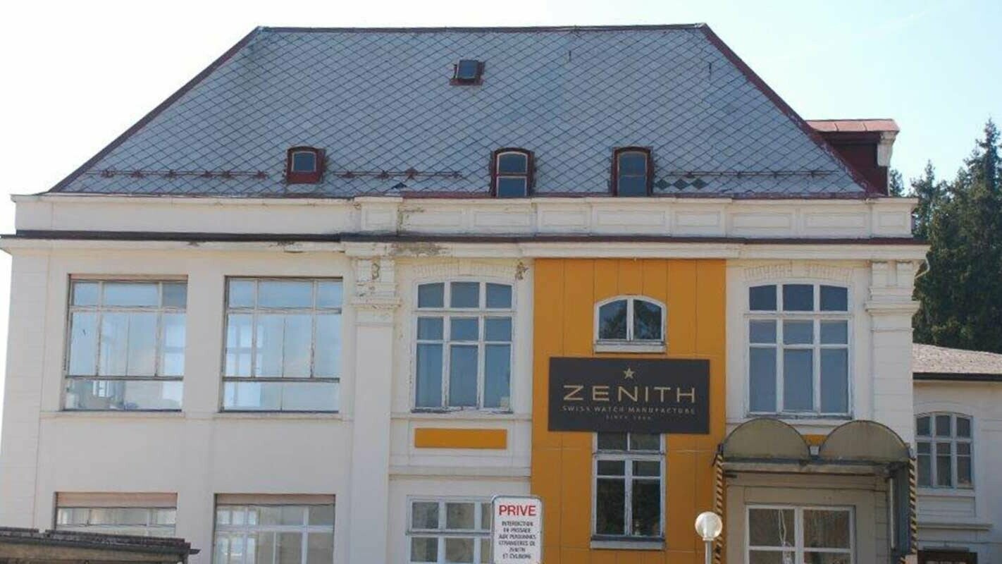 Industrial building before roof renovation with PREFA roof tiles in P.10 brown