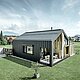 Detached house with gable roof, roof and façade are covered with PREFALZ standing seam from PREFA in P.10 anthracite. The panels of the roof surface extend across the façade. Part of the façade is clad with weathered wood.