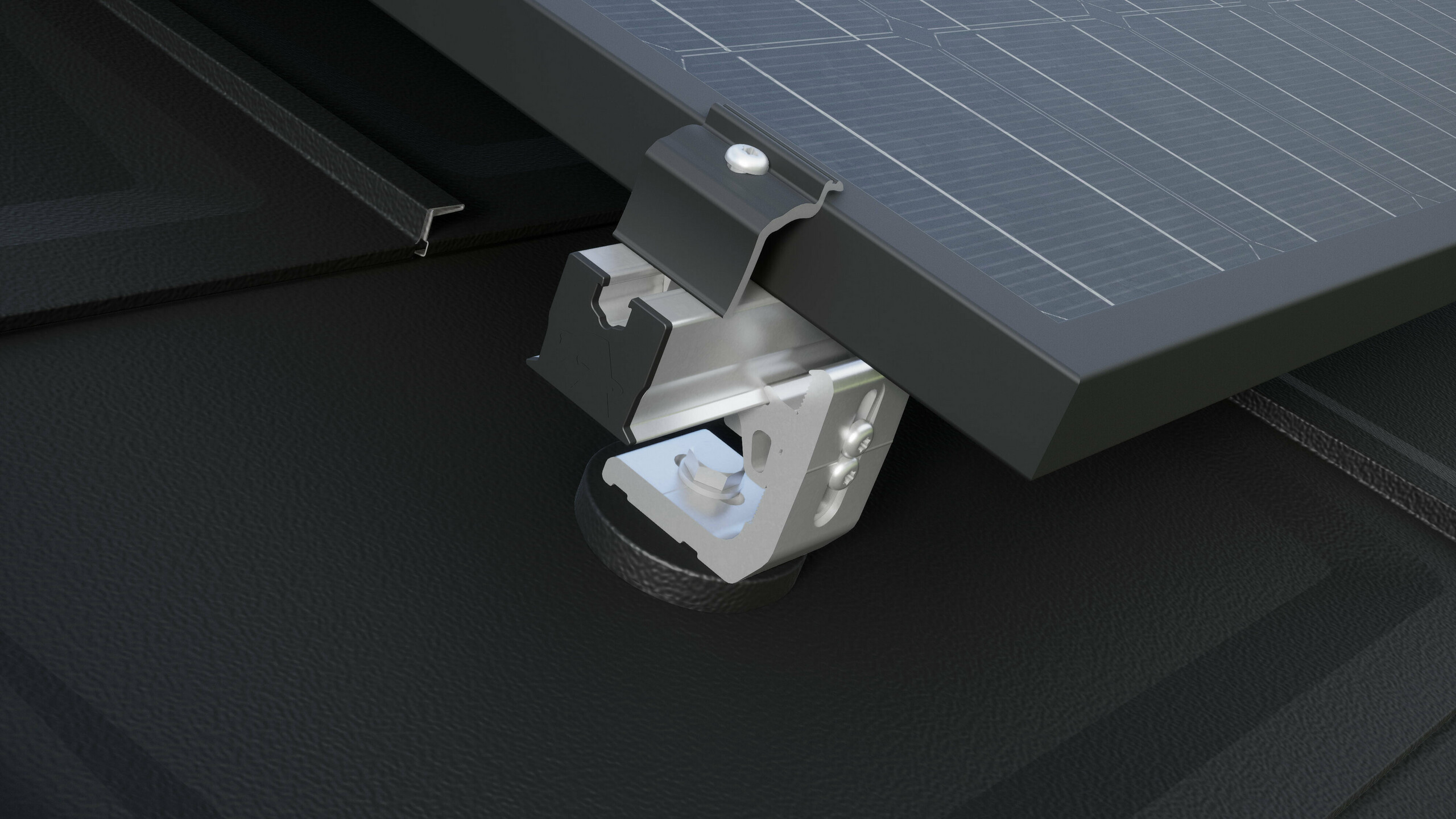 Close-up of the PREVARIO 3.S solar bracket mounted on a dark PREFA roof, which supports the profile rail. The solar module was fastened to the profile rail using the PREVARIO end clamp.